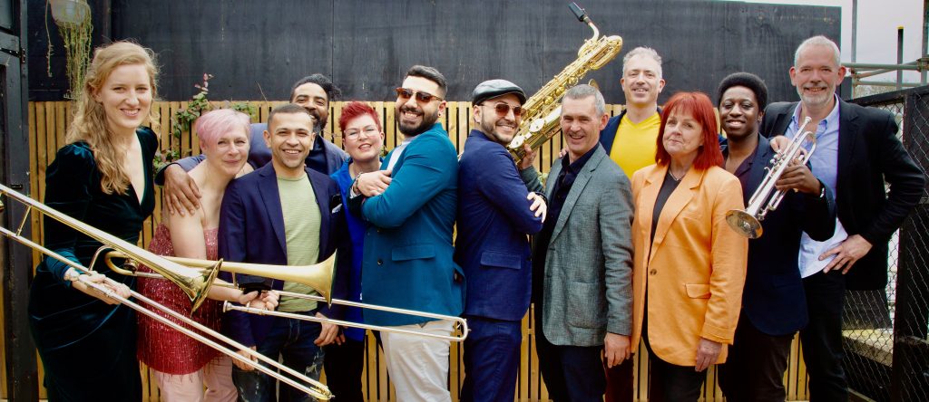 This image has an empty alt attribute; its file name is ORQUESTA_-MAMBARITO8692-Glammed-up-1024x444.jpeg
